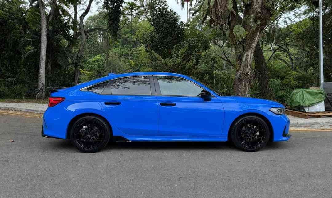 Honda Civic 1.5 VTEC Turbo (A) (Category: Used Cars) located in Singapore. Submitted by carousell_certified_partners (Listing ID 1461807211, Image 2). Description: 1 owner low mileage unit! Perfectly modified with TypeR bodykit. Comes with additional 3 years engine n gearbox warranty! Well maintained & sporty looking Civic FE. loan/Inhouse loan available. Trade ins welcome. STA Evaluation can be arranged. Contact our friendly salesperson to sched