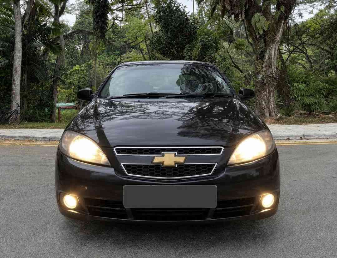 Chevrolet Optra Magnum Sedan 1.6 (A) (Category: Used Cars) located in Singapore. Submitted by carousell_certified_partners (Listing ID 1465105457, Image 1). Description: Good condition! 100% full loan available! 100% phv loan available! Cheapest and lowest depreciation in the market! 1 of only 6 dealers in singapore to be awarded roll of honor by SGCM! Buy with confidence! In-house loan or bank loan available! Fast and easy loan approval! Sales C