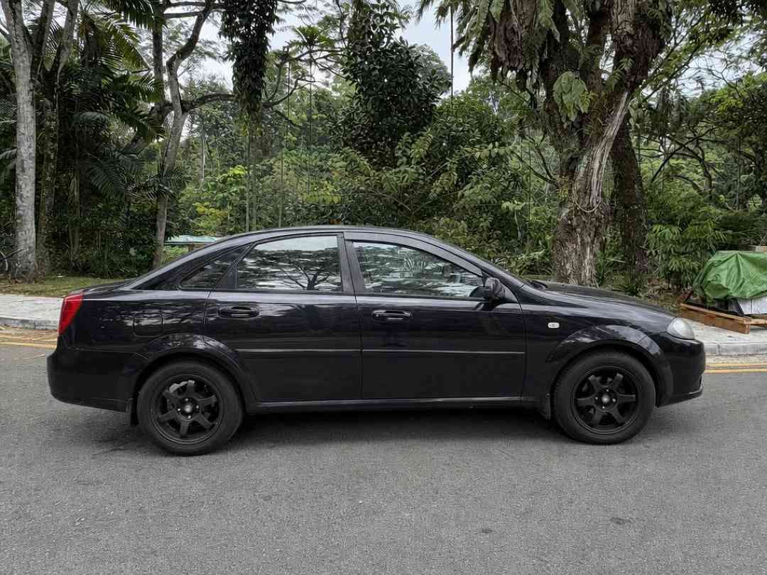 Chevrolet Optra Magnum Sedan 1.6 (A) (Category: Used Cars) located in Singapore. Submitted by carousell_certified_partners (Listing ID 1465105457, Image 2). Description: Good condition! 100% full loan available! 100% phv loan available! Cheapest and lowest depreciation in the market! 1 of only 6 dealers in singapore to be awarded roll of honor by SGCM! Buy with confidence! In-house loan or bank loan available! Fast and easy loan approval! Sales C