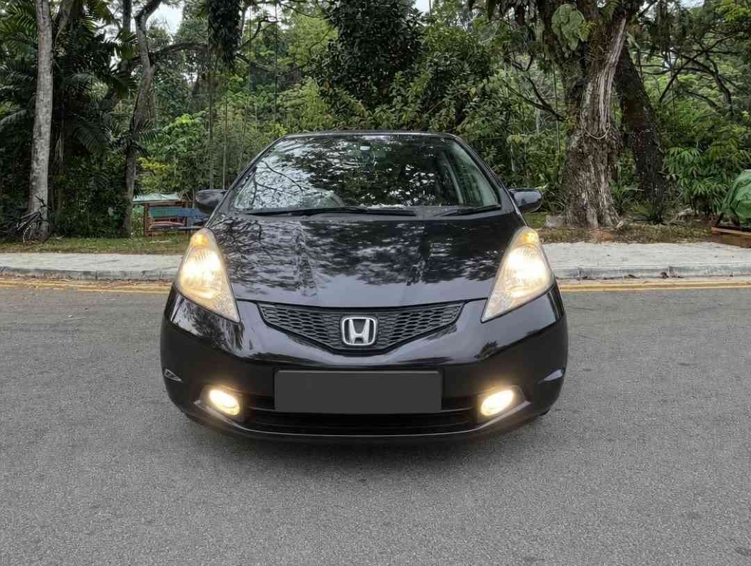 Honda Fit 1.3 G (A) (Category: Used Cars) located in Singapore. Submitted by carousell_certified_partners (Listing ID 1463941887, Image 1). Description: Good condition! 100% full loan available! 100% phv loan available! Cheapest and lowest depreciation in the market! 1 of only 6 dealers in singapore to be awarded roll of honor by SGCM! Buy with confidence! In-house loan or bank loan available! Fast and easy loan approval! Features: Airbags, ABS, 