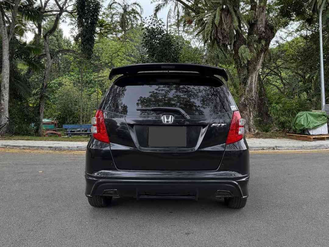 Honda Fit 1.3 G (A) (Category: Used Cars) located in Singapore. Submitted by carousell_certified_partners (Listing ID 1463941887, Image 3). Description: Good condition! 100% full loan available! 100% phv loan available! Cheapest and lowest depreciation in the market! 1 of only 6 dealers in singapore to be awarded roll of honor by SGCM! Buy with confidence! In-house loan or bank loan available! Fast and easy loan approval! Features: Airbags, ABS, 