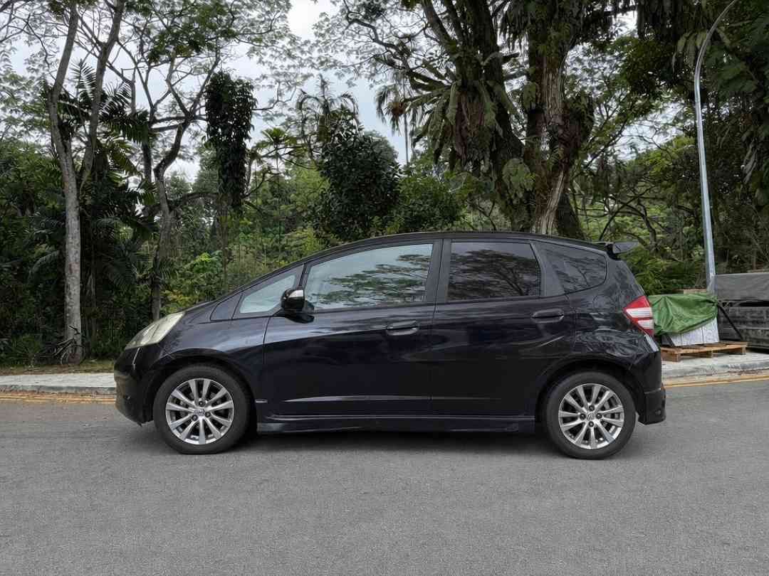 Honda Fit 1.3 G (A) (Category: Used Cars) located in Singapore. Submitted by carousell_certified_partners (Listing ID 1463941887, Image 2). Description: Good condition! 100% full loan available! 100% phv loan available! Cheapest and lowest depreciation in the market! 1 of only 6 dealers in singapore to be awarded roll of honor by SGCM! Buy with confidence! In-house loan or bank loan available! Fast and easy loan approval! Features: Airbags, ABS, 