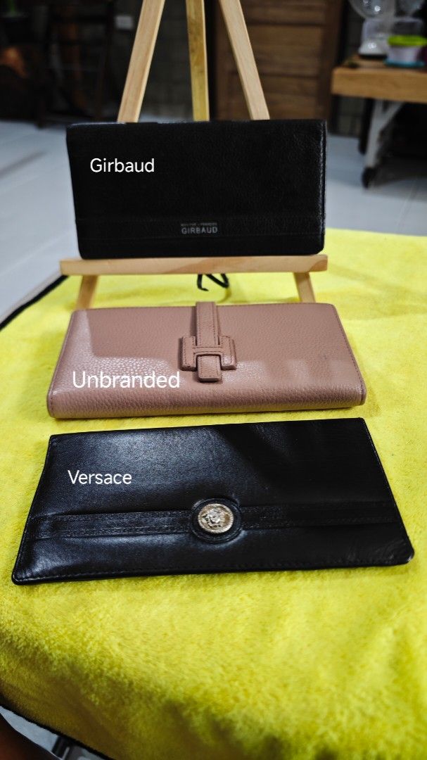 3 for ₱500 Assorted Designer and Branded Wallets Lot (Category: Wallets & Card holders) located in Digos. Submitted by behappybepeaceful (Listing ID 1465173181, Image 1). Description: - Set of 9 pre-loved/stylish long wallets - Trusted brands included: Girbaud, Versace, Valentino, GoldLion, VincisBench, and more - Diverse designs featuring textured leather, smooth finishes, flap closures, snap buttons, and chic hardware accents - Great bundle for