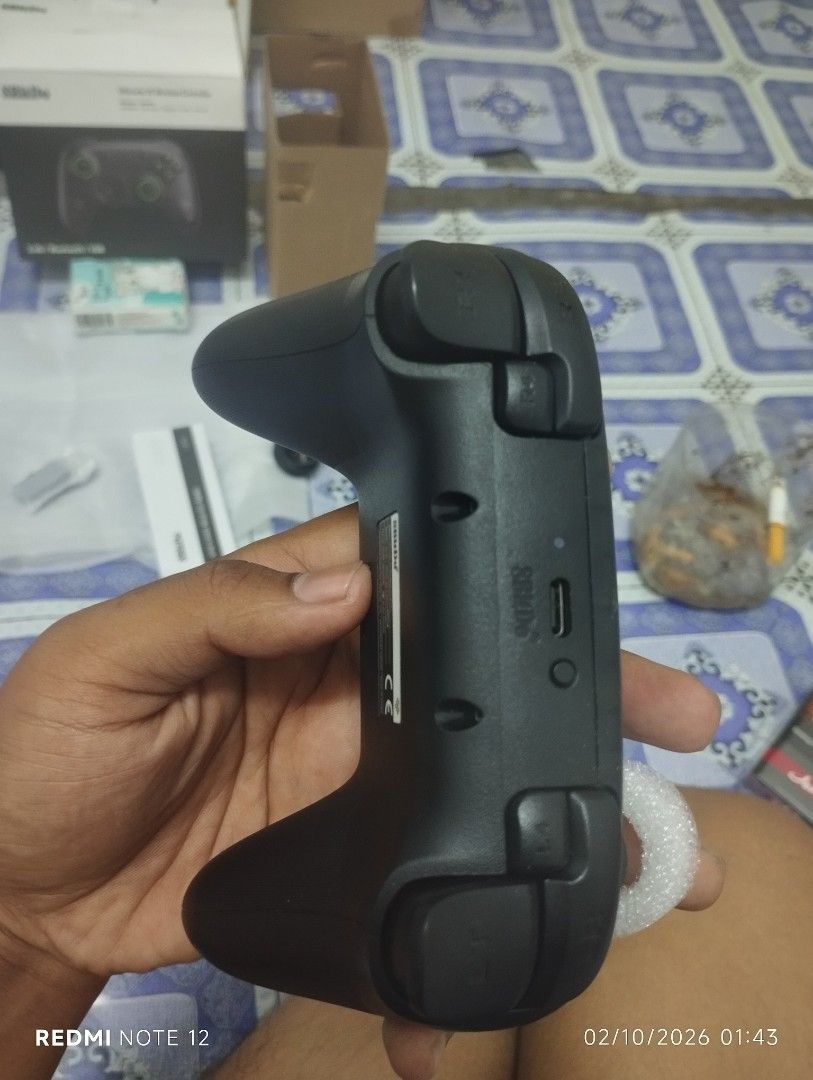 8BitDo Ultimate 2C Wireless Controller (Category: Controllers) located in Kuala Lumpur. Submitted by razzi283 (Listing ID 1465362598, Image 2). Description: - Model: 8BitDo Ultimate 2C Wireless Game Controller (Black) - Compatibility: Windows and Android - Connectivity: 2.4G wireless, Bluetooth, and wired USB - Features: Rear shoulder buttons and extra macro buttons - Extras: Thumbsticks equipped with protective foam rings - What's Included: Cont