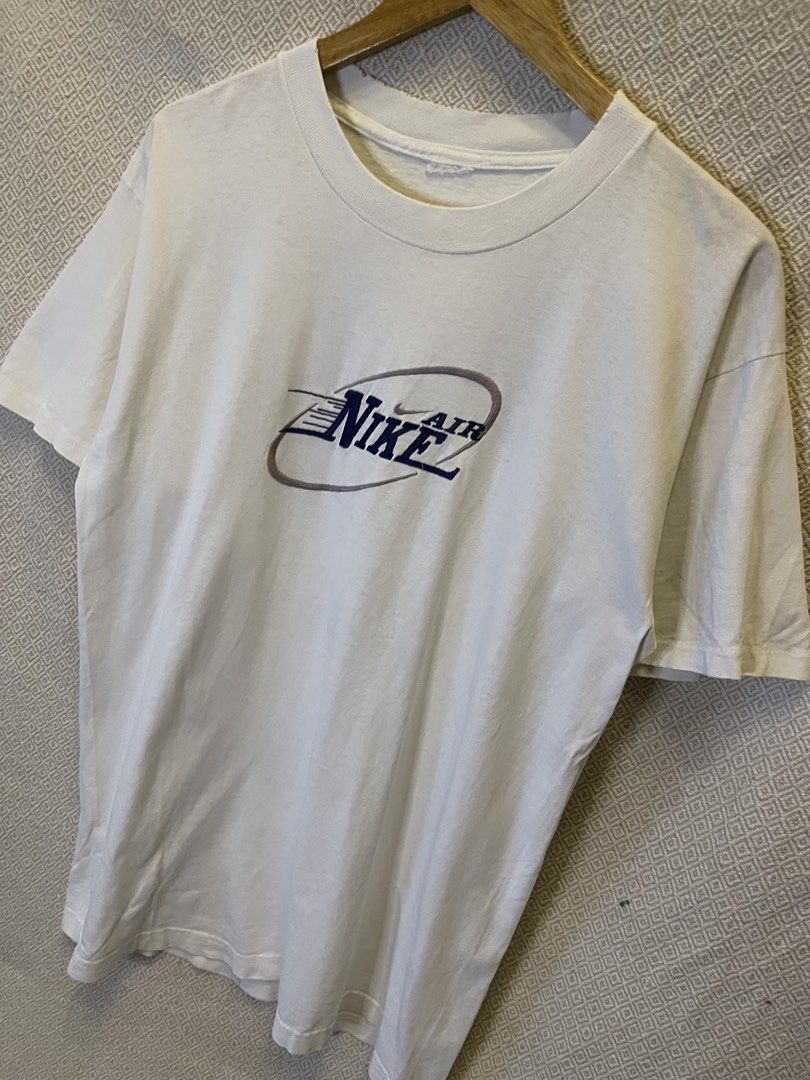 90s nike logo tee (Category: Tshirts & Polo Shirts ) located in Manila. Submitted by hypestock_mnl (Listing ID 1465194544, Image 2). Description: - stylish - perfect for casual wear - great fit - in good condition - minimal signs of usage - 9/10 - money worth! - see pics for details/issue.