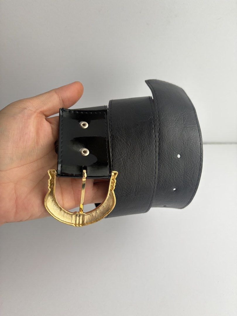 9. Black Glossy Belt (Category: Belts) located in Quezon City. Submitted by wagwagan_ukay_blues (Listing ID 1465233373, Image 3). Description: From Japan In good condition Signs of usage Please manage your expectations Hole size - 24”-27” Width -1.5” Overall-30 Novaliches Qc.