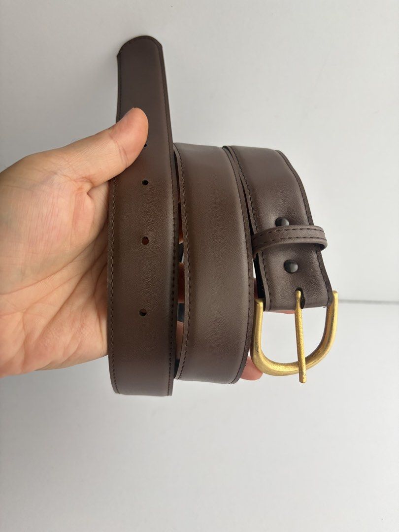 9. Brown Leather Belt 53 (Category: Belts) located in Quezon City. Submitted by wagwagan_ukay_blues (Listing ID 1465233793, Image 2). Description: From Japan In good condition Signs of usage Please manage your expectations Hole size -30”-34” Width -1.1” Overall-37” Novaliches Qc.