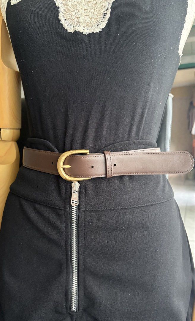 9. Brown Leather Belt 53 (Category: Belts) located in Quezon City. Submitted by wagwagan_ukay_blues (Listing ID 1465233793, Image 1). Description: From Japan In good condition Signs of usage Please manage your expectations Hole size -30”-34” Width -1.1” Overall-37” Novaliches Qc.