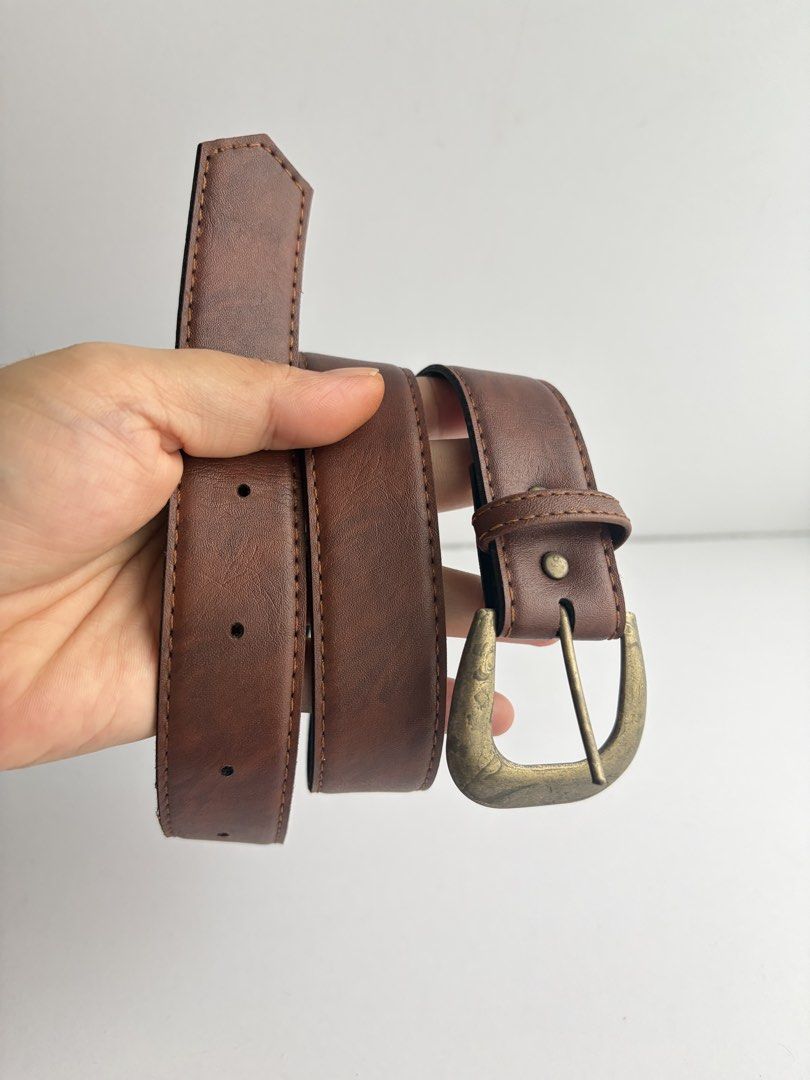 9. Brown Leather Belt 54 (Category: Belts) located in Quezon City. Submitted by wagwagan_ukay_blues (Listing ID 1465234206, Image 2). Description: From Japan In good condition Signs of usage Please manage your expectations Hole size -23”-27” Width -1.1” Overall-30” Novaliches Qc.
