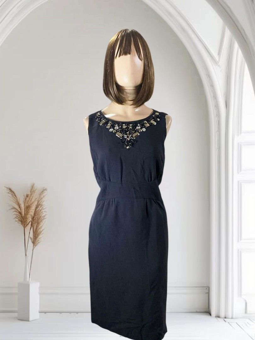 ✨ MICHAEL KORS Embellished Black Shift Dress ✨ (Category: Dresses) located in Manila. Submitted by shopyourstyleph (Listing ID 1465382106, Image 3). Description: MICHAEL KORS sleeveless black cocktail/shift dress featuring a prominent, intricately embellished neckline accented with multi-toned crystals, rhinestones, and beads. This classic little black dress (LBD) offers a tailored silhouette with a defined waist panel that seamlessly transitions