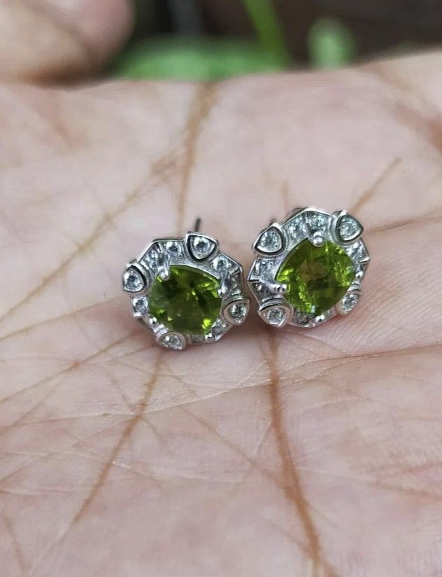 💯 Natural PERIDOT earrings (Category: Earrings) located in Kawit. Submitted by authentic_gemstones_byalton (Listing ID 1465326637, Image 2). Description: Set in 925 silver (w/ markings) Stud type Brand new item.