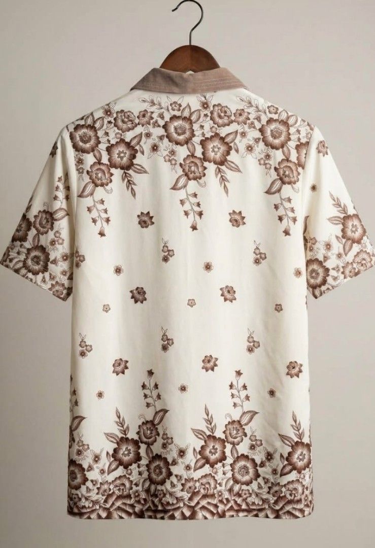 ✨ Vintage Cream & Brown Floral Button-Down Blouse (Category: Blouses) located in Kalibo. Submitted by cloth.ly (Listing ID 1465255129, Image 2). Description: 📏 Measurements: • Pit to Pit: 19.5" × 2 = 39" • Length: 28" • Waist: 19" × 2 = 38" • Shoulder Width: 16" • Sleeve Length: 11" — short sleeves • Cuff Sleeve: 7" 💎 Details: • Vintage style — elegant floral border print 🌸 • Cream base with warm brown floral design • Contrast taupe collar • D