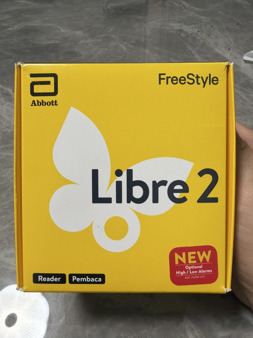 Abbott FreeStyle Libre 2 Reader (Category: Health Monitors & Weighing Scales) located in Singapore. Submitted by joehartanto76 (Listing ID 1465327593, Image 1). Description: - Brand: Abbott FreeStyle Libre 2 Reader - Condition: Brand new, factory sealed, unopened - Color: Yellow packaging - Features: Continuous glucose monitoring with optional high and low alarms - Deal method: Meet-up or local postage available.
