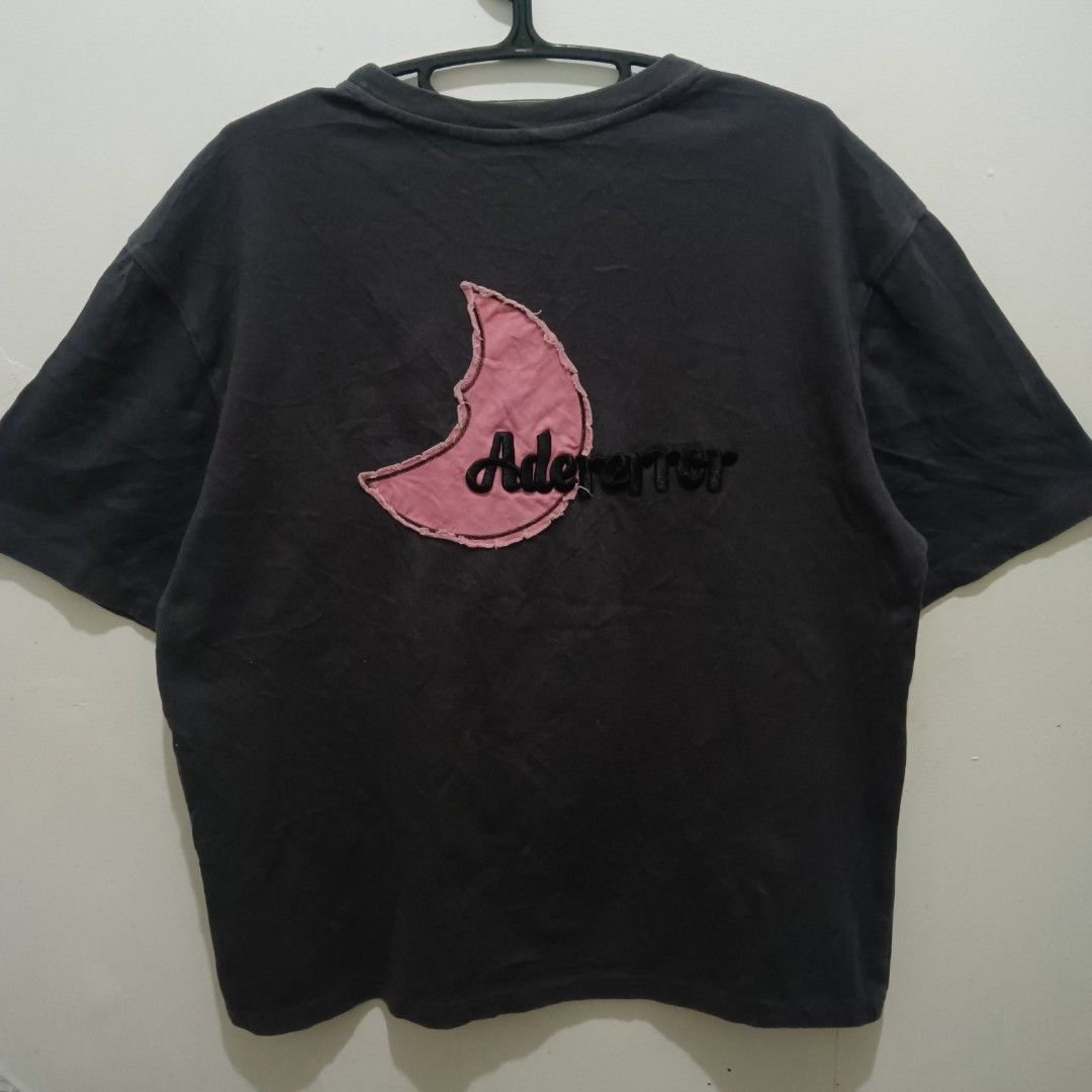 ADER ERROR Pink Moon Shirt (Category: Tshirts & Polo Shirts ) located in Caloocan City. Submitted by jaychingsss (Listing ID 1465296062, Image 1). Description: Ader Error Pink Moon Shirt - 250 22x29 Heavy Cotton Complete Tags Color Rate: 9.5/10 No issue NEED WASH.