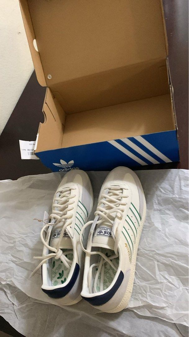 Adidas Handball Spezial (Category: Casual Shoes) located in Manila. Submitted by kobi5 (Listing ID 1465187534, Image 1). Description: - Brand: Adidas - Model: Spezial - Colorway: White leather with green stripes and blue heel tabs - Details: Suede overlays on toe/heel, gold foil Spezial lettering - Condition: Clean soles, crisp laces, great everyday streetwear pair - Inclusion: Original blue and white Adidas shoebox with tissue paper.