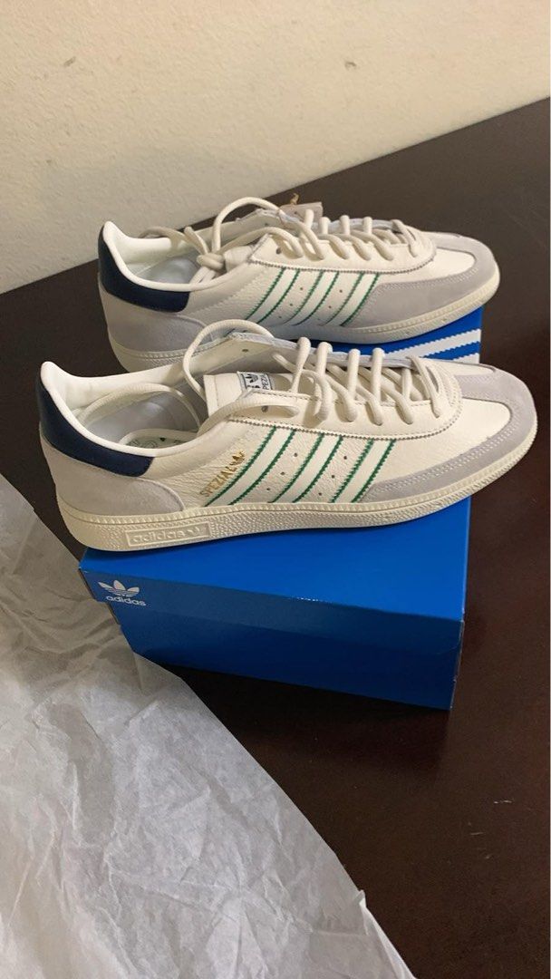 Adidas Handball Spezial (Category: Casual Shoes) located in Manila. Submitted by kobi5 (Listing ID 1465187534, Image 2). Description: - Brand: Adidas - Model: Spezial - Colorway: White leather with green stripes and blue heel tabs - Details: Suede overlays on toe/heel, gold foil Spezial lettering - Condition: Clean soles, crisp laces, great everyday streetwear pair - Inclusion: Original blue and white Adidas shoebox with tissue paper.