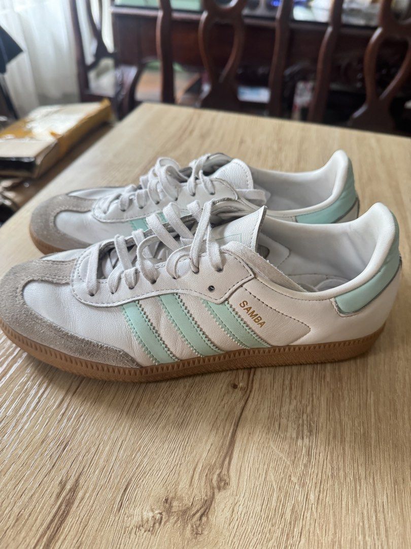 Adidas Samba Clear Mint White Sneakers US 6 (Category: Sneakers) located in Manila. Submitted by chie04_875 (Listing ID 1465195725, Image 2). Description: - Brand/Model: Adidas Samba sneakers - Color: White leather with clear mint green stripes and heel tab, grey suede toe overlay, and classic gum sole - Size: US 6, UK 5.5, FR 38 2/3 - Condition: Worn just a couple of times, extremely clean uppers and soles - Style: Super versatile everyday pair 