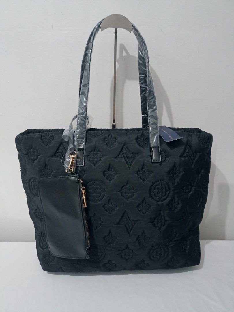 Adrienne Vittadini Soho Collection Quilted Tote (Category: Tote Bags) located in Kabacan. Submitted by prelovedbags.ph (Listing ID 1465234537, Image 2). Description: Bnew. Quilted Nylon material. Large size. With detachable wristlet pouch. Authentic 🇺🇲.