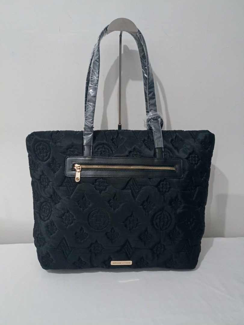 Adrienne Vittadini Soho Collection Quilted Tote (Category: Tote Bags) located in Kabacan. Submitted by prelovedbags.ph (Listing ID 1465234537, Image 1). Description: Bnew. Quilted Nylon material. Large size. With detachable wristlet pouch. Authentic 🇺🇲.
