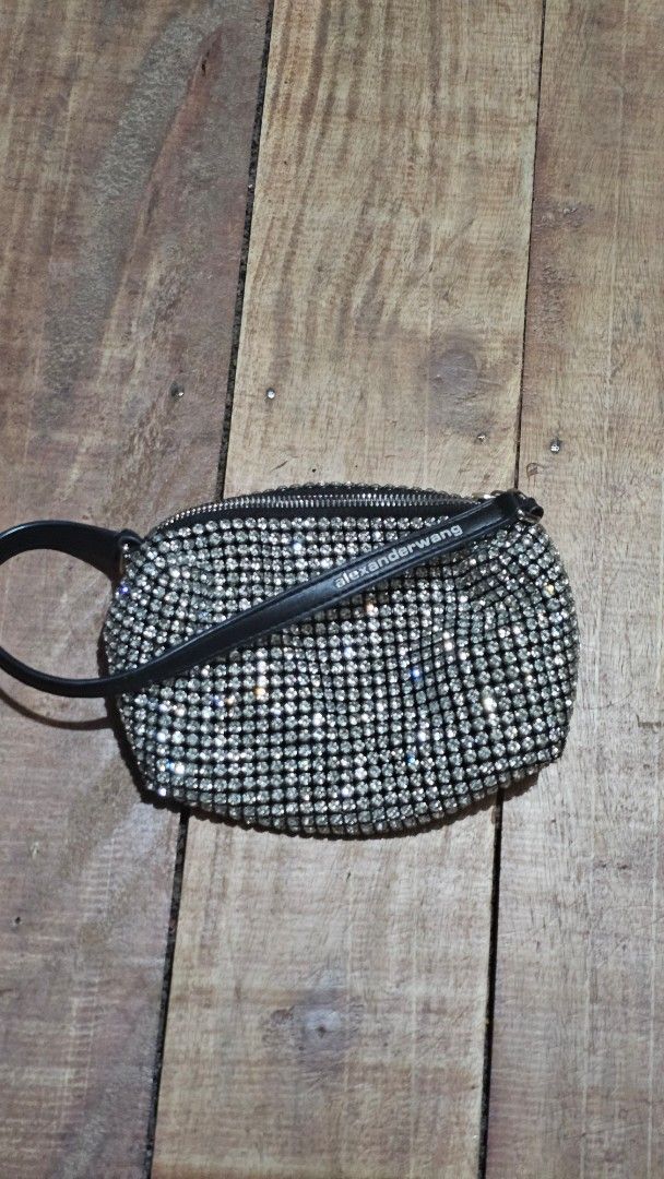 Alexander Wang Rhinestone Handbag (Category: Luxury Bags & Wallets) located in Kibawe. Submitted by Thrift_ni_Babac (Listing ID 1465224640, Image 2). Description: - Brand: Alexander Wang - Color: Black and silver with all-over sparkling crystals - Strap: Black leather shoulder strap featuring white logo text - Closure: Zip top with custom hardware - Interior: Black fabric lining with New York branded patch - Ideal for: Nights out, dinners, partie