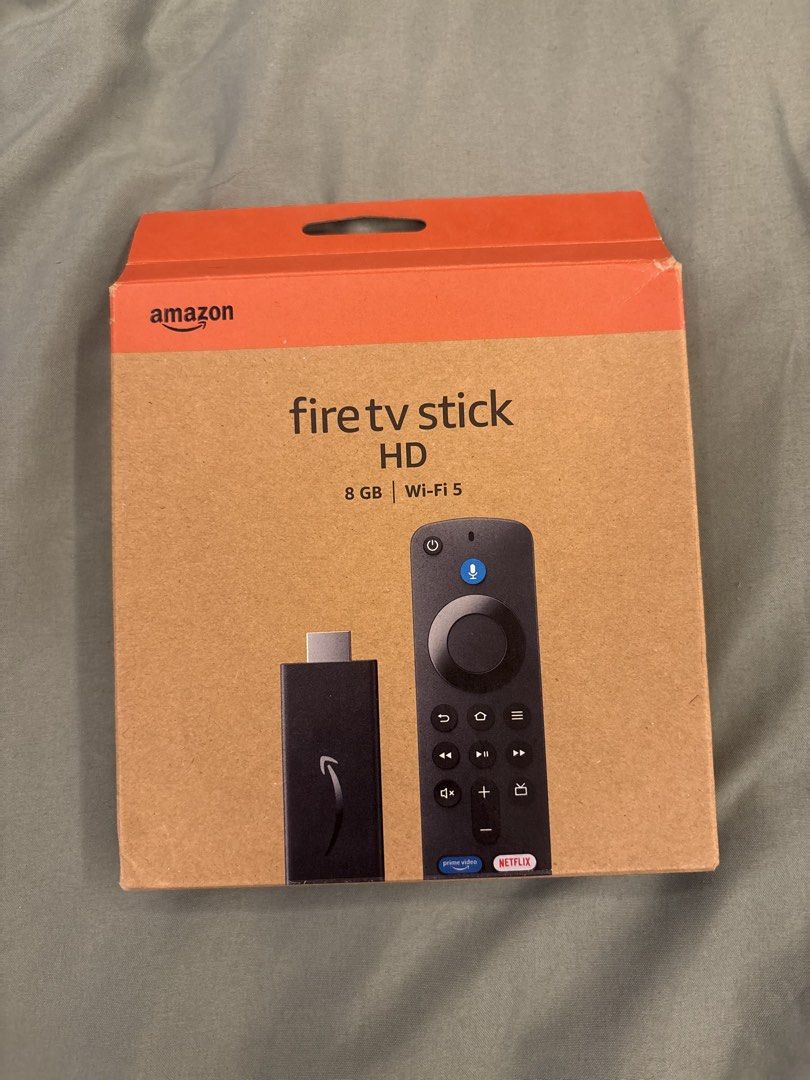Amazon Fire TV Stick HD 8GB Wi-Fi 5 (Category: TV Parts & Accessories) located in Quezon City. Submitted by aguilartam12610 (Listing ID 1465254209, Image 1). Description: Amazon Fire TV Stick HD with 8GB storage and Wi-Fi 5 support. Streams in full 1080p with HDR. Includes Alexa Voice Remote, two AAA batteries, power adapter, power cable, and HDMI extender cable. Box is unopened and sealed. Quick way to get Netflix, Prime Video, Disney+, Apple TV