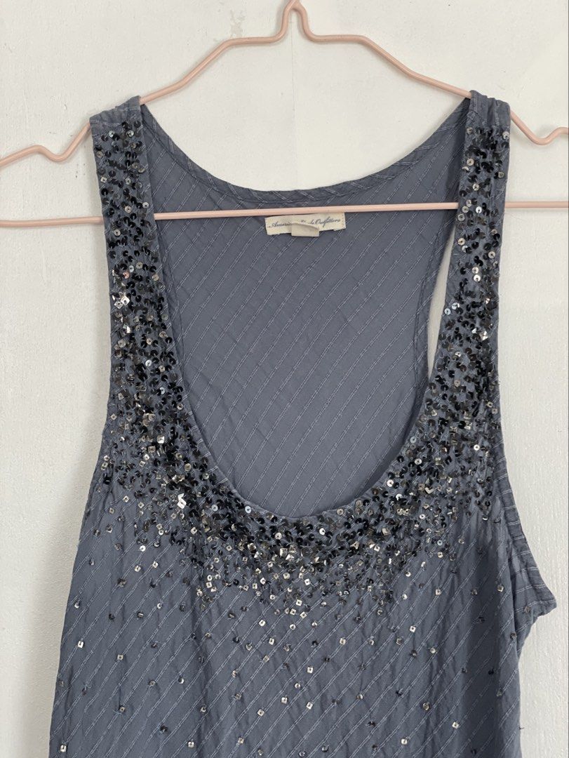 American Eagle Beaded Sleeveless Top (Category: Sleeveless) located in Tuguegarao City. Submitted by ziggerryy (Listing ID 1465372017, Image 2). Description: No flaws. No holes Fits S-M.