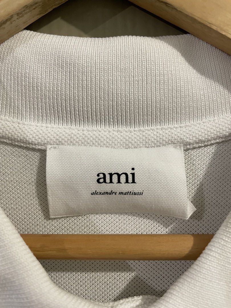 AMI 3ple White Polo-Shirt (Category: Luxury Apparel) located in Makati City. Submitted by gustavoo28 (Listing ID 1465260729, Image 2). Description: Authentic/Legit No issues 10/10 Color Rate Very Good Condition 23W 29L in inches Check photos for reference.