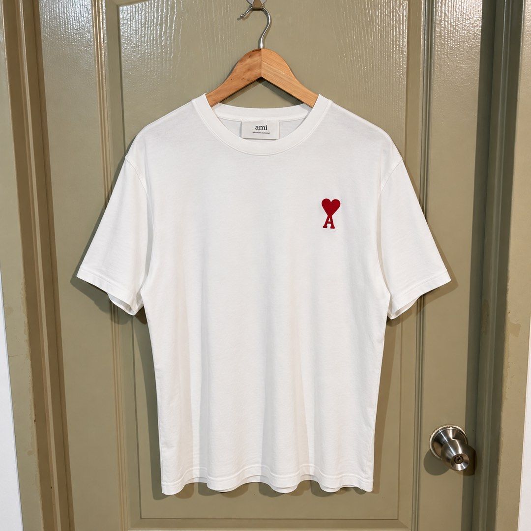 AMI Big Heart Tee (Category: Tshirts & Polo Shirts ) located in Makati City. Submitted by gustavoo28 (Listing ID 1465350974, Image 1). Description: Authentic/Legit No issues 10/10 Color rate Very Good Condition 22W 28L Check photos for reference.