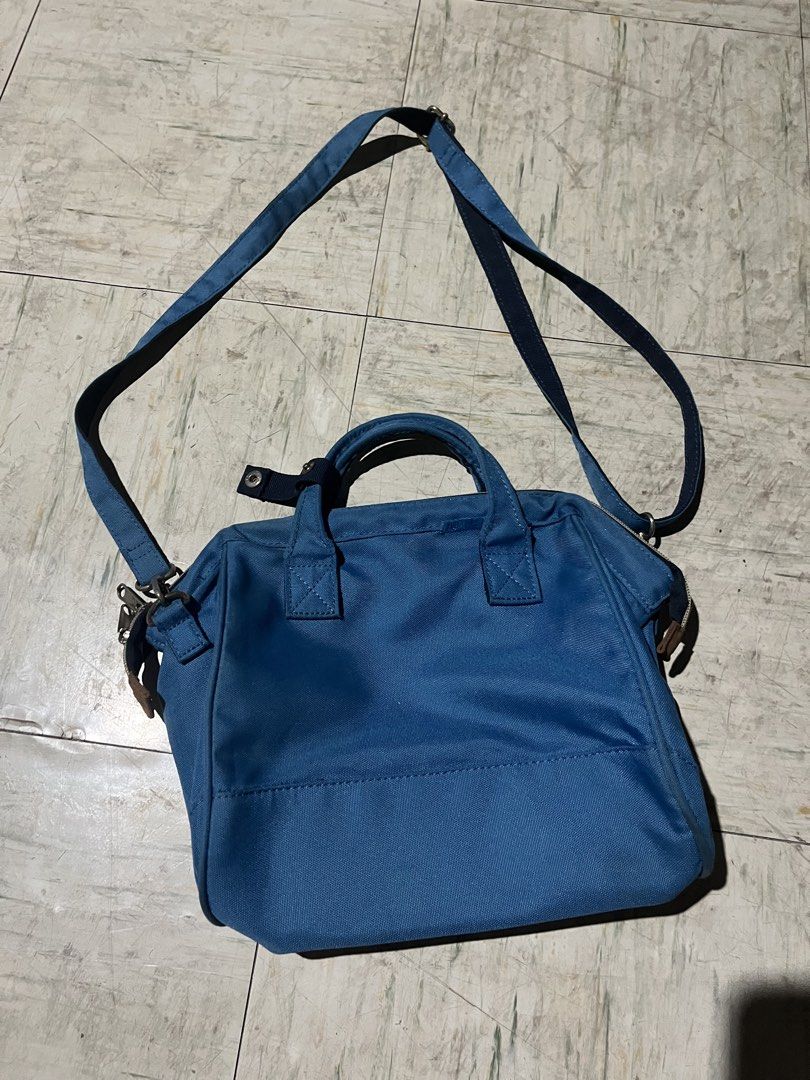 Anello Blue Canvas Shoulder Bag (Category: Backpacks) located in Makati City. Submitted by byamary (Listing ID 1465312830, Image 2). Description: - Authentic Anello canvas bag in classic blue - Dual top handles and adjustable shoulder strap for versatile wear - Front zip pocket with stylish leather pull tab and woven brand patch - Elegant gold-tone hardware details - Multiple compartments for easy organization - Durable fabric, ideal for daily co
