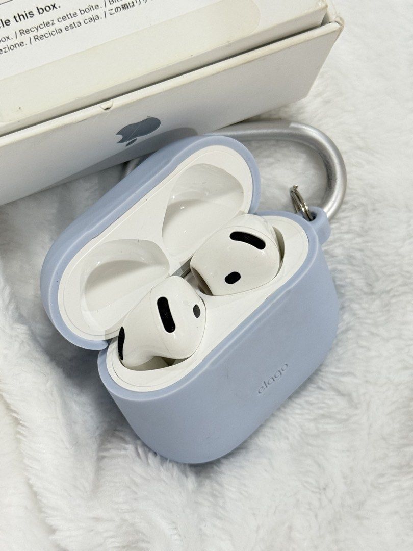 Apple AirPods 4 (Category: Earphones) located in Cavite. Submitted by jeramiea (Listing ID 1465247693, Image 3). Description: - Authentic Apple AirPods 4 - Clean condition, well-maintained inside and out - Includes original retail box, manual, charging case, and both earbuds - Free blue Elago silicone case with metal carabiner clip attached - RFS: Decluttering - Meet-ups or shipping via buyer's preferred courier.