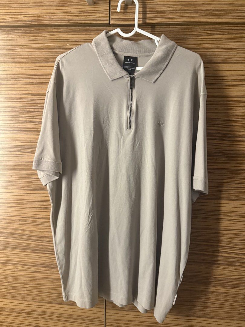 Armani Exchange Zip Polo Shirt Neutral (Category: Tshirts & Polo Shirts ) located in Makati City. Submitted by stallionmegx (Listing ID 1465329049, Image 1). Description: Large.