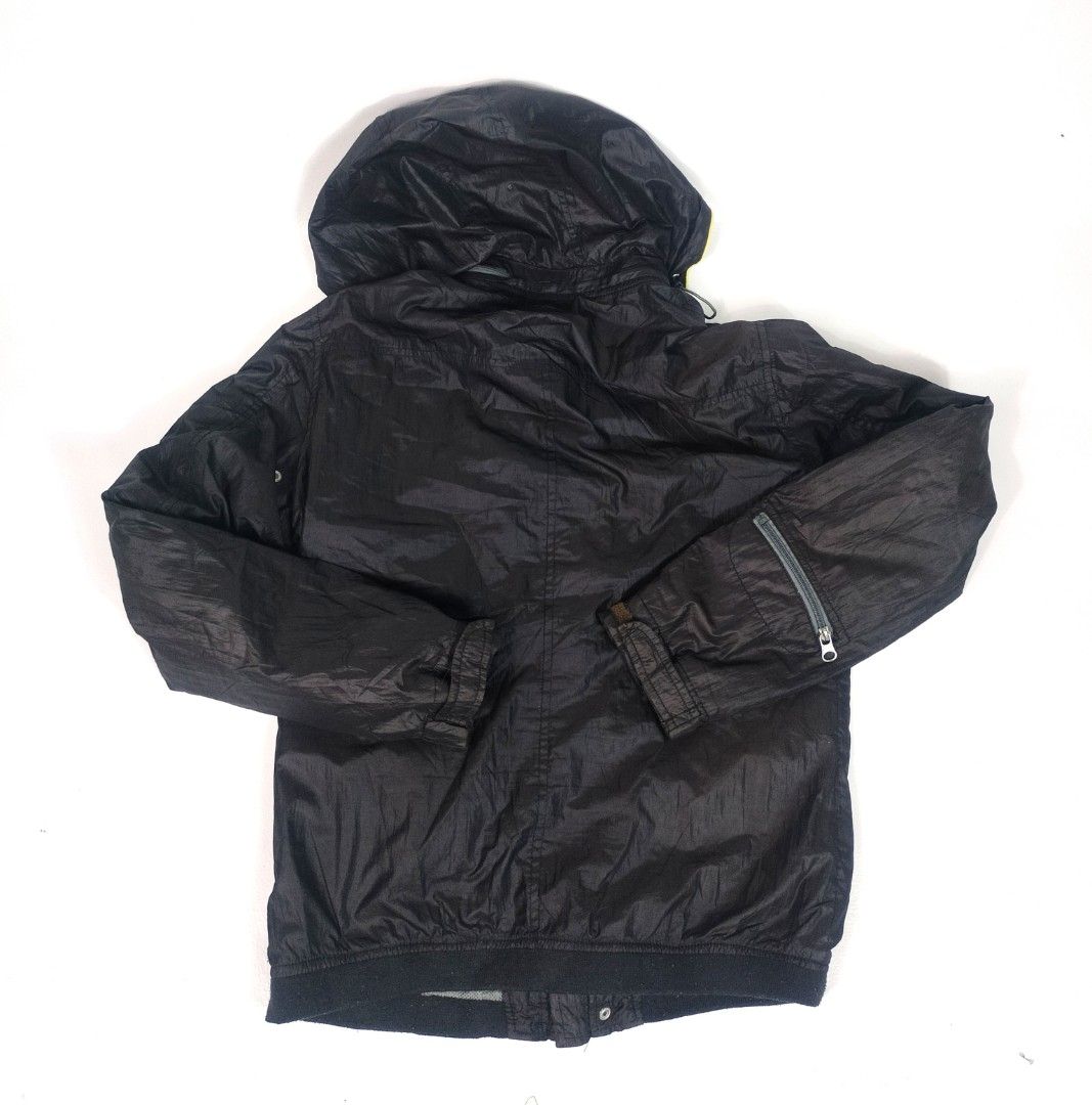 Armani GA Vintage Windbreaker (Category: Coats, Jackets and Outerwear) located in Manila. Submitted by callmetin (Listing ID 1465297043, Image 2). Description: Condition : Verygood Size : Small Dimension 👇 Chest : 21 Lenght : 26 Shoulder : 17 Sleeve : 24 Issue : 2 snaplock Button Damage But may zipper naman sya . - Color: Black with vibrant yellow trim details on the hood and drawstrings - Lining: Breathable mesh lining inside for comfort - Bran