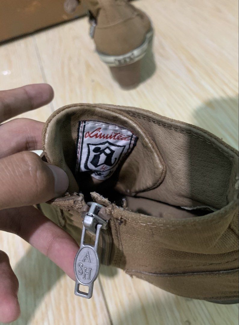 ASH Brown Wedge Sneaker Boots Size 37 (Category: Boots) located in Manila. Submitted by hajisura (Listing ID 1465354481, Image 1). Description: - Brand: ASH - Style: Wedge sneaker boots - Color: Brown - Size: EU 37 - Details: High wedge heel, rubber soles, and toe caps - Closures: Side zippers with ASH branded pull tabs and multiple side buckle straps - Special Feature: Inner label features rare Limited branding - Condition: Excellent buyer-frien