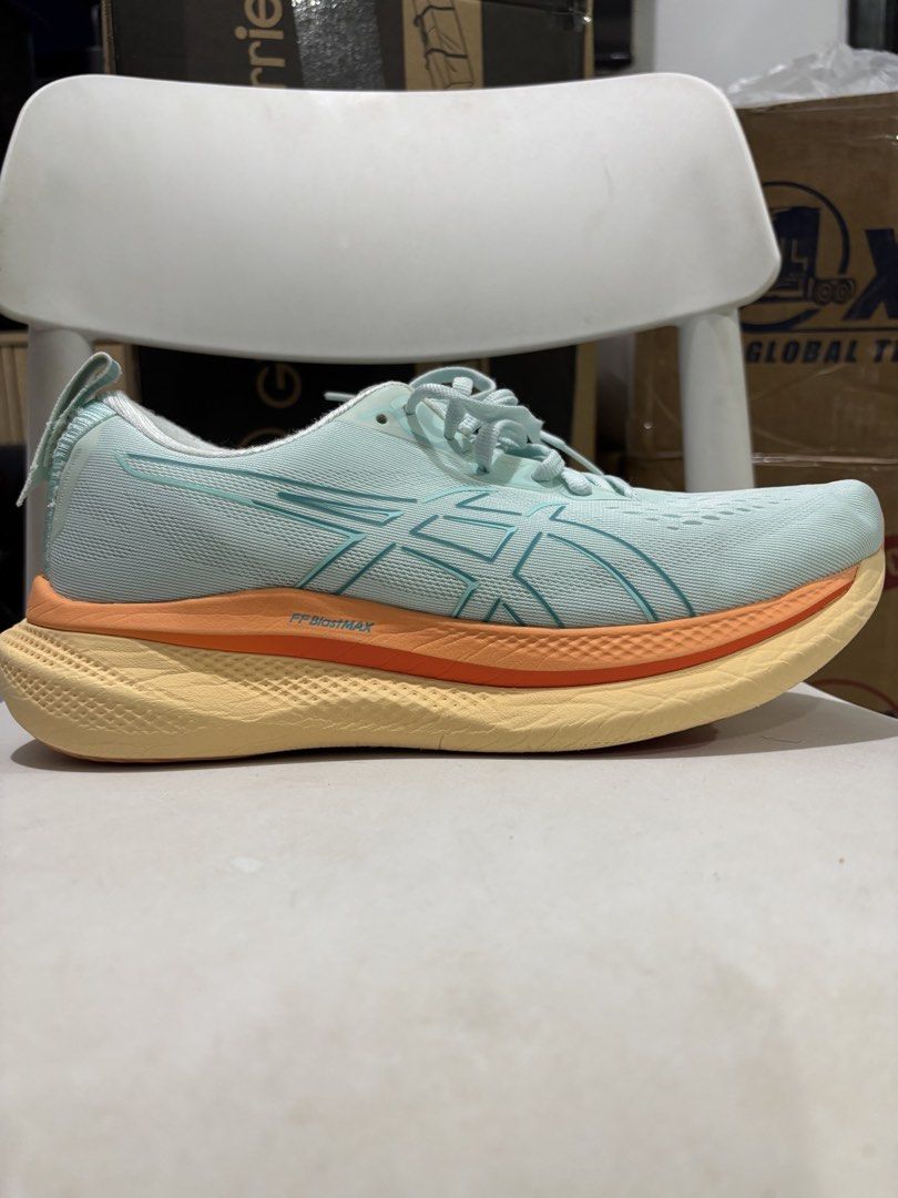 Asics Glideride Max Light Teal Running Shoes Size US 10 (Category: Casual Shoes) located in Manila. Submitted by jonard2297 (Listing ID 1465274946, Image 1). Description: - Brand/Model: Asics Glideride Max - Colorway: Light Teal, Orange, and Yellow - Size: US 10 / EU 42 / CM 26.5 - Condition: Lightly tested, outsoles show minor dirt - Defect: Small fabric tear near the left heel pull tab (see last photo) - Performance: Cushioning and grip still h