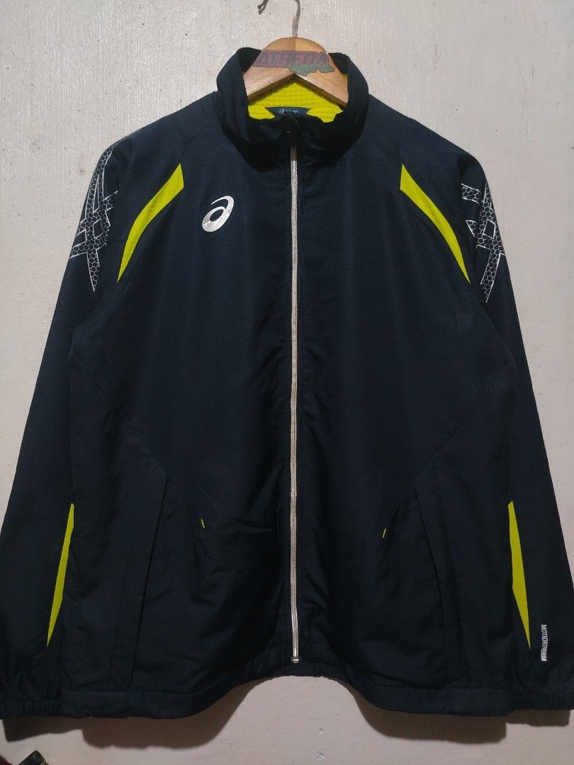 Asics Motiontherm Windbreaker Jacket (Category: Coats, Jackets and Outerwear) located in Rizal. Submitted by gmpastoffi75031 (Listing ID 1465322989, Image 1). Description: - Brand: Asics - dimes 23x27.5 - Color: Black with lime green and silver reflective accents - Features: Full zip closure, high collar, elastic cuffs, and Motiontherm tech print - Fabric: Lightweight with subtle honeycomb texture - Best for: Running, training, and casual sportsw