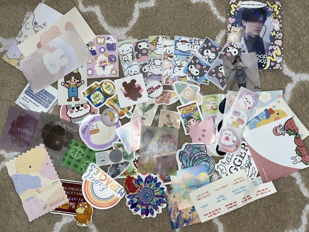 Assorted Aesthetic Stickers (Category: Art & Prints) located in Tarlac. Submitted by yuejunnie (Listing ID 1465246839, Image 2). Description: - Assorted lot of stickers, memo pads, pins - Features Sanrio characters, cute animals, ducks, rainbows, florals, and quotes - Perfect for decorating notebooks, journals, and phone cases - Sold as a complete set - 60 pcs.