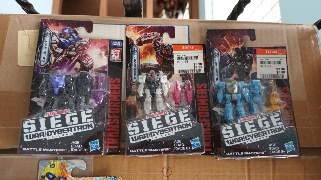 Assorted Transformers (Category: Toy Figures) located in Singapore. Submitted by starscreamie (Listing ID 1465280323, Image 3). Description: SELLING INDIVIDUALLY! 1) BLURR SHATTERED GLASS MISB- $42 2) CYBERVERSE BUMBLEBEE MOSC - $15 3) SIEGE BATTLEMASTERS - $10 EACH 4) OPTIMUS PRIME MOSC - $8 5) LIFT-TICKET MISB - $ 42.