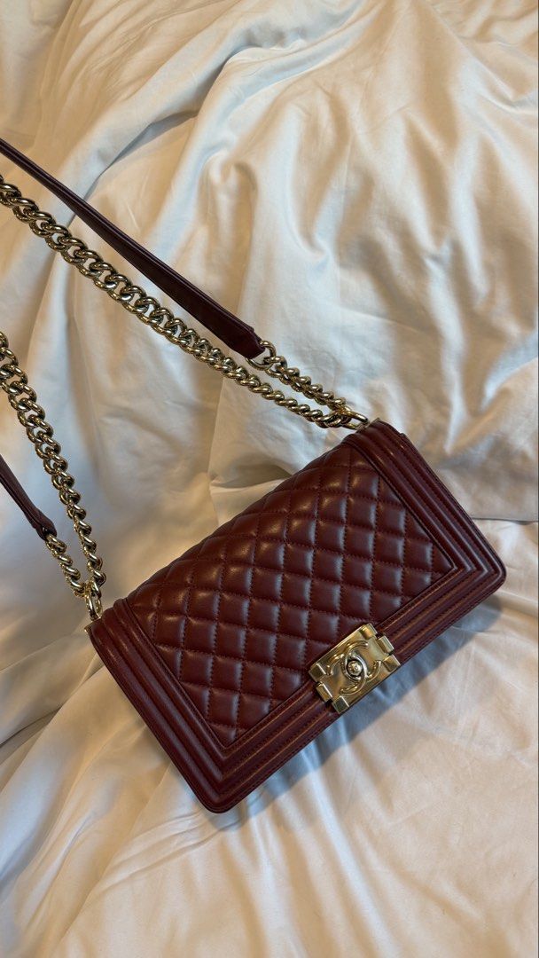 Authentic Chanel Le Boy Old Medium Burgundy Bag (Category: Luxury Bags & Wallets) located in Taguig. Submitted by maliashoppingaccount (Listing ID 1465290220, Image 1). Description: Authentic Chanel Le Boy Old Medium Series 22 With authenticity card, dustbag, box 💯 Money back guarantee Can add legitgrails certificate for sure buyer Meetup in BGC Lalamove/Grab LBC RFS: Moving out and selling all my things .