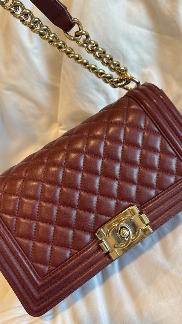Authentic Chanel Le Boy Old Medium Burgundy Bag (Category: Luxury Bags & Wallets) located in Taguig. Submitted by maliashoppingaccount (Listing ID 1465290220, Image 3). Description: Authentic Chanel Le Boy Old Medium Series 22 With authenticity card, dustbag, box 💯 Money back guarantee Can add legitgrails certificate for sure buyer Meetup in BGC Lalamove/Grab LBC RFS: Moving out and selling all my things .