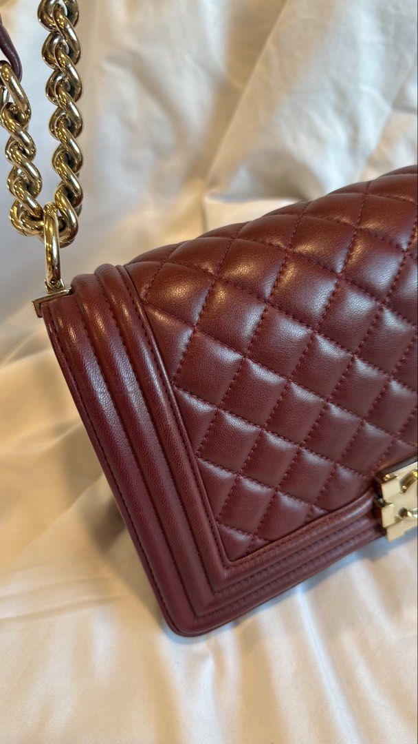 Authentic Chanel Le Boy Old Medium Burgundy Bag (Category: Luxury Bags & Wallets) located in Taguig. Submitted by maliashoppingaccount (Listing ID 1465290220, Image 2). Description: Authentic Chanel Le Boy Old Medium Series 22 With authenticity card, dustbag, box 💯 Money back guarantee Can add legitgrails certificate for sure buyer Meetup in BGC Lalamove/Grab LBC RFS: Moving out and selling all my things .