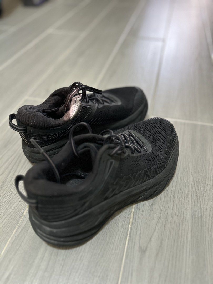 Authentic Hoka (Category: Sneakers) located in Manila. Submitted by daniii_1 (Listing ID 1465237810, Image 2). Description: - Brand/Model: Hoka One One Bondi 7 - Color: Triple Black - Size: Women's US 6 / EU 37.3 / UK 4.5 / JPN 23 (Wide Fit) - Features: Breathable mesh upper, ultra-plush thick cushioned foam sole, includes black laces - Condition: Minor wear visible around the collar and inner lining from regular use, overall still very supportiv