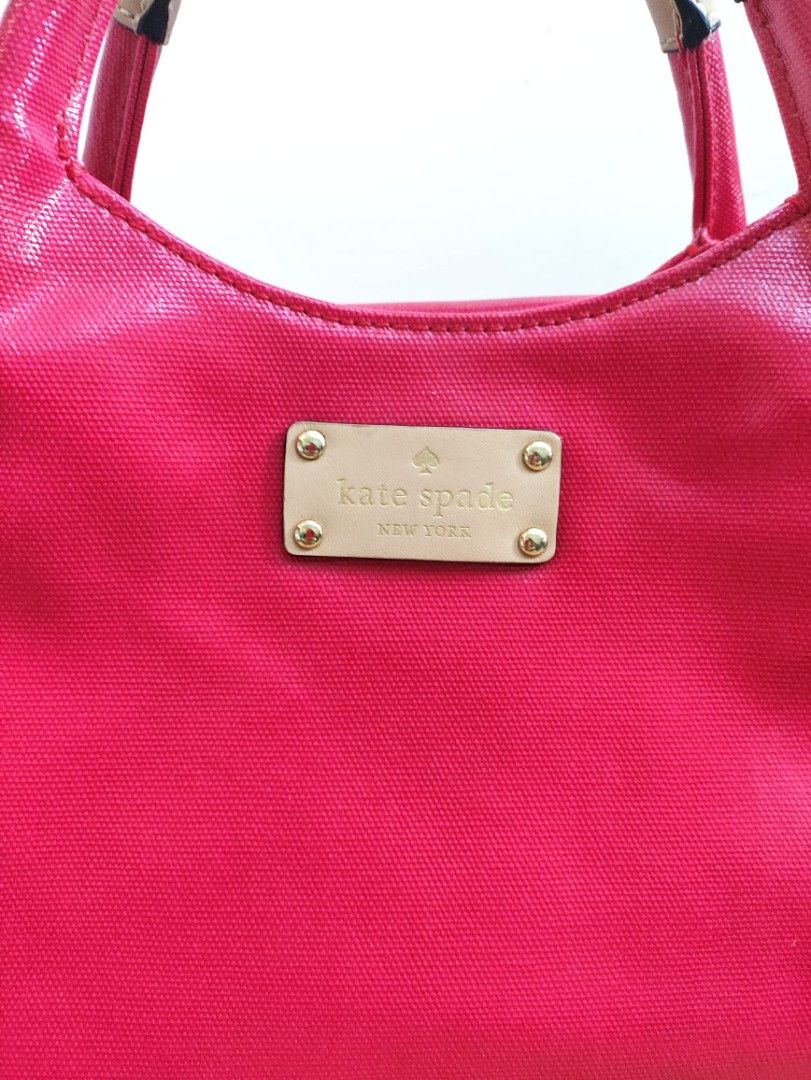 Authentic Kate Spade fulton patent dumpling hand bag (Category: Tote Bags) located in Rizal. Submitted by hsiri1128 (Listing ID 1465299266, Image 2). Description: 💯✔️Legit CONDITION : 9/10 ISSUE / FLAWS : None. still in excellent condition MATERIAL : Coated patent material w/ gold hardwares DETAILS : Light weight only. Spacious inside. stand alone. Magenta color. fit ipad inside and folding umbrella.