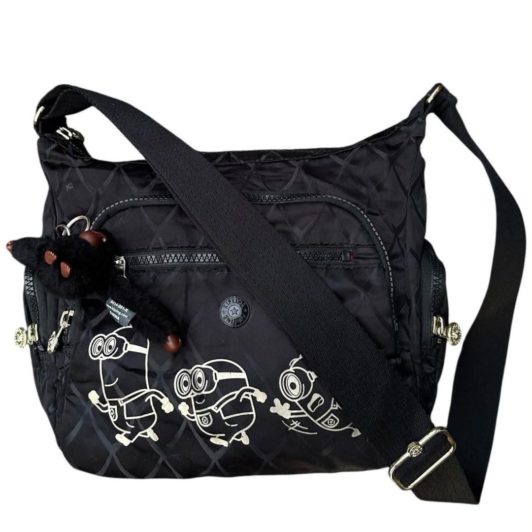 Authentic KIPLING X Minions (Category: Cross-body Bags) located in San Fabian. Submitted by rei_aniels (Listing ID 1465344051, Image 2). Description: Authentic KIPLING x Minions Collab Like new Semi medium size Light Weight Adjustable Strap Like new Black .