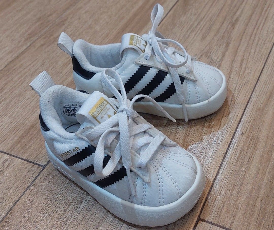 Little ADIDAS Superstar Shoes (Category: Babies & Kids Fashion) located in Batangas. Submitted by pre_love_3rdy (Listing ID 1465379549, Image 3). Description: price+shipping fee size on the picture used once sa bahay lumaki na agad si baby, di na nagkasya sa feet..