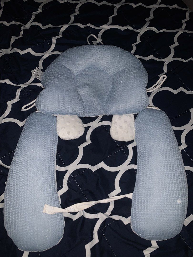 Baby Head Shaping Pillow Anti-Flat Blue (Category: Children's Beds) located in Manila. Submitted by annikka.cloud (Listing ID 1465349321, Image 1). Description: - Blue baby shaping pillow with adjustable side support rolls - Breathable textured fabric for baby's comfort - Cute white plush paw details on the headrest - Convenient loops for hanging or securing - Strap with snap-button closure to keep lower support arms in place - Clean, sanitized, 