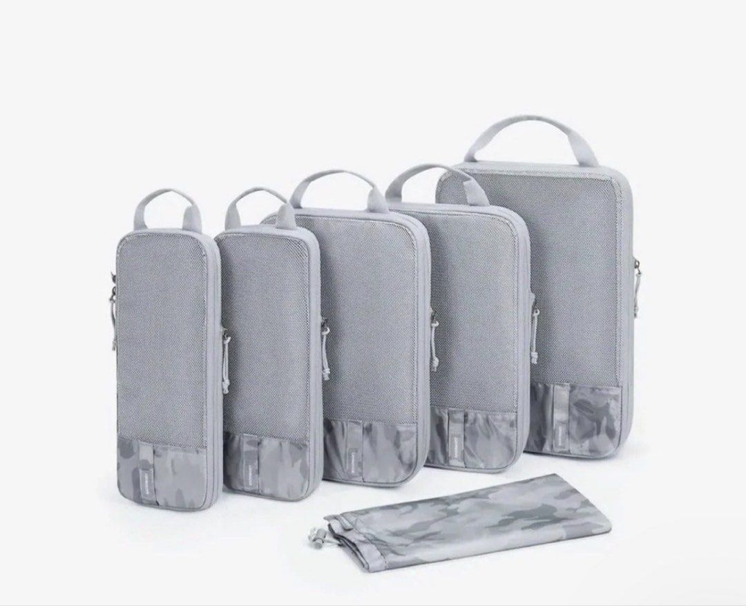 BAGSMART COMPRESSION PACKING CUBES SET-GRAY (Category: Travel Essentials & Accessories) located in Quezon City. Submitted by carsenmktg (Listing ID 1465301263, Image 1). Description: BAGSMART COMPRESSION PACKING CUBES SET-GRAY DESCRIPTION LIGHT-WEIGHT TRAVEL ACCESSORIES: The packing organizers are lightweight, stylish, and designed to fit easily into carry-on suitcases. TRUE SPACE SAVING: They feature expandable and compression capabilities, allo