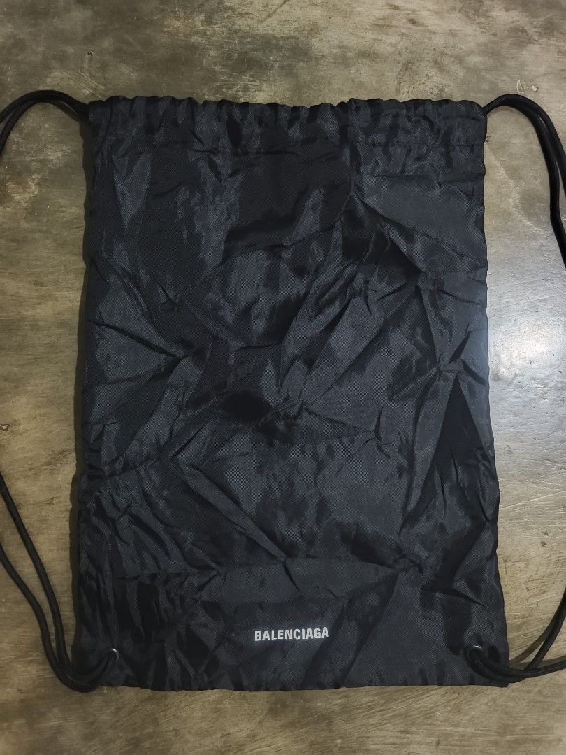 Balenciaga Black Drawstring Backpack (Category: Backpacks) located in Koronadal. Submitted by zxckeeeny_ (Listing ID 1465338803, Image 3). Description: ‎Balenciaga Drawstring Bag ‎W: 13 close to 13.5 ‎L: 18 close to 19 ‎10/10 ‎black na black pa ‎excellent ‎no issue.