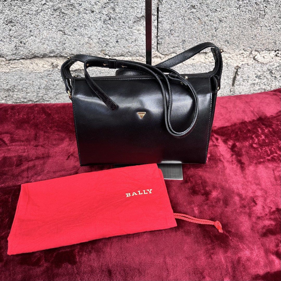 BALLY Smooth calf skin Two-Way Bag. (Category: Shoulder Bags) located in Cagayan de Oro. Submitted by kjcartier26 (Listing ID 1465261907, Image 2). Description: Authentic Bally Smooth calfskin Bag. 🇯🇵 - In excellent condition. - With Original Dustbag red. - Adjustable strap, Durable leather. - Has minimal signs of use, Pressmark, Scratches not visible..