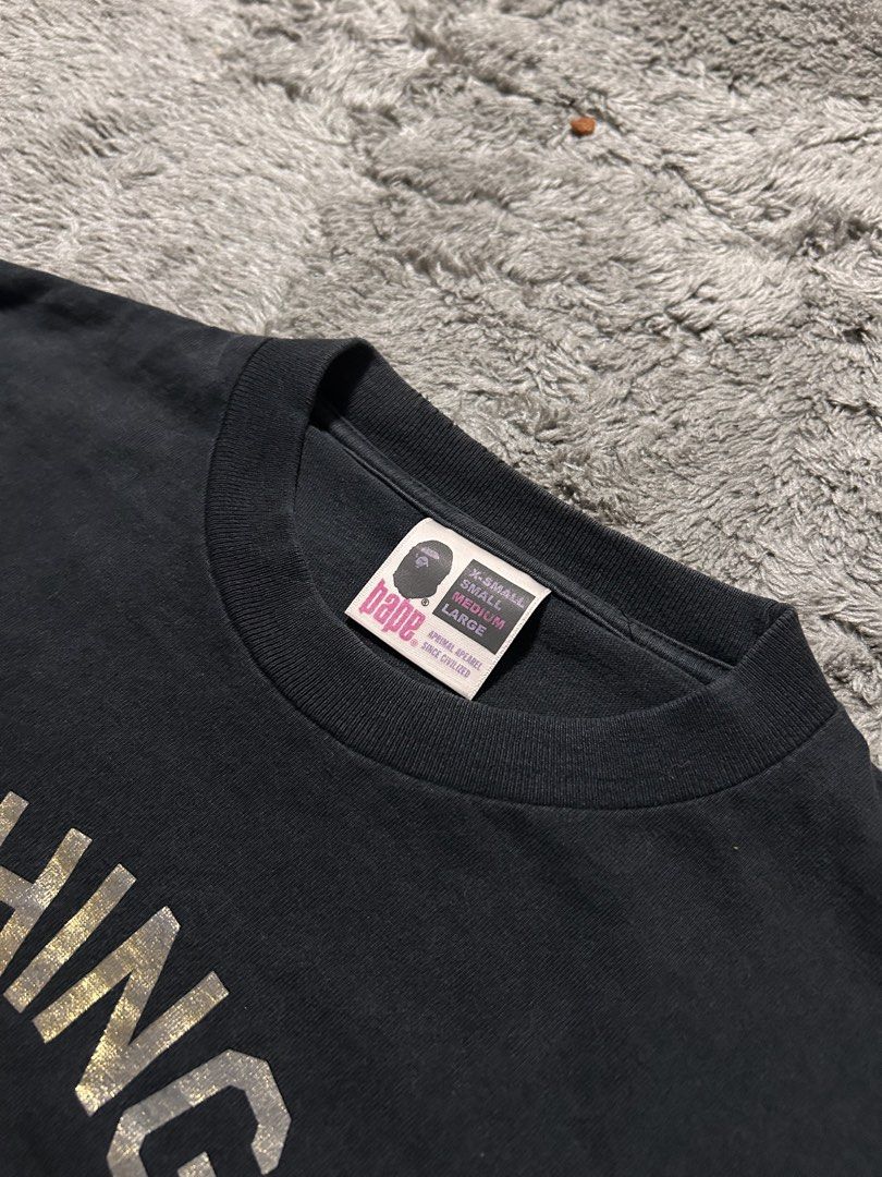 Bape OG General Made (Category: Tshirts & Polo Shirts ) located in Lapu Lapu. Submitted by teriyakiboi6021 (Listing ID 1465278945, Image 2). Description: Bape OG General Made Medium Legit / Authentic Good Condition Dimes: 19x28 Flaws: Pinholes neckline (see pic) CR: 8.5/10 DM to purchase📲.