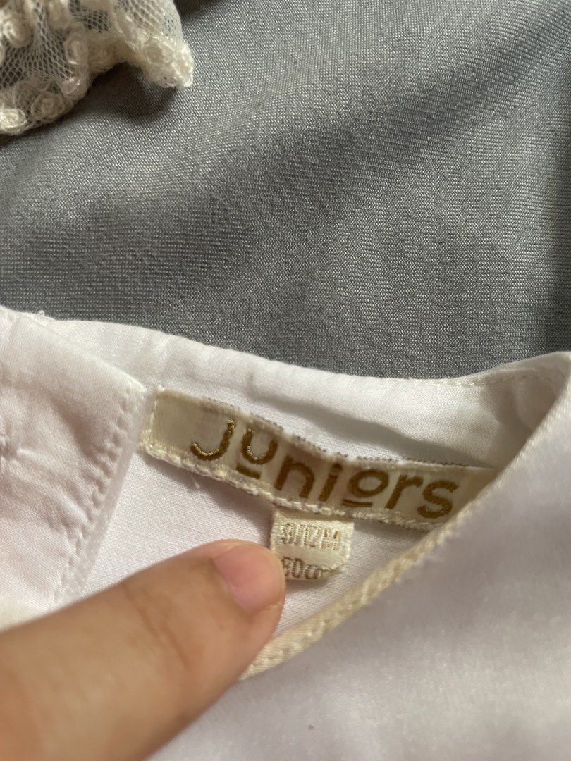 Baptismal dress set (Category: Babies & Kids Fashion) located in Cainta. Submitted by cof.fee (Listing ID 1465176834, Image 3). Description: - Brand: Juniors - Size: 9-12 months (80cm) on tag but runs small, best fit 6 months‼️ - Color: Classic White - Set includes: Sleeveless satin dress with large front bow and back buttons, matching lace bonnet with ties, and white t-strap baby shoes with scalloped edges - Condition: Worn once, super clean and